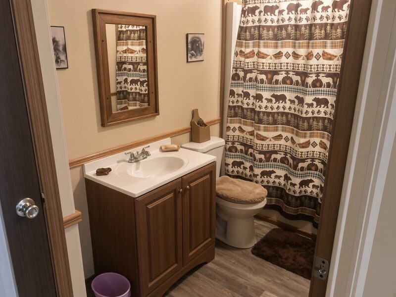 Bathroom painted end to end as part of a remodel, walls cut in around the vanity and trim.